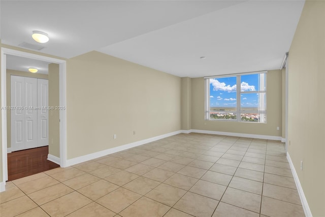 2681 N Flamingo Rd Unit 1903S, Sunrise, FL 33323 - unfurnished room featuring light tile patterned floors and baseboards