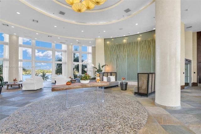 2681 N Flamingo Rd Unit 1903S, Sunrise, FL 33323 - building lobby with a towering ceiling and recessed lighting