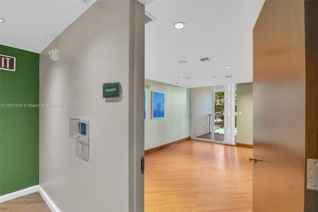 2681 N Flamingo Rd Unit 1903S, Sunrise, FL 33323 - corridor with wood finished floors and recessed lighting