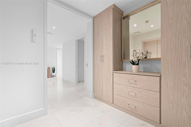 700 NE 26th Ter Unit 3101, Miami, FL 33137 - hallway featuring light marble finish floors and recessed lighting
