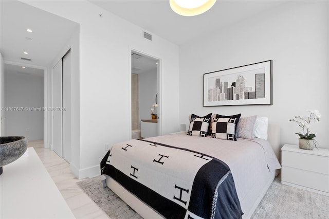 700 NE 26th Ter Unit 3101, Miami, FL 33137 - bedroom with connected bathroom, recessed lighting, and a closet