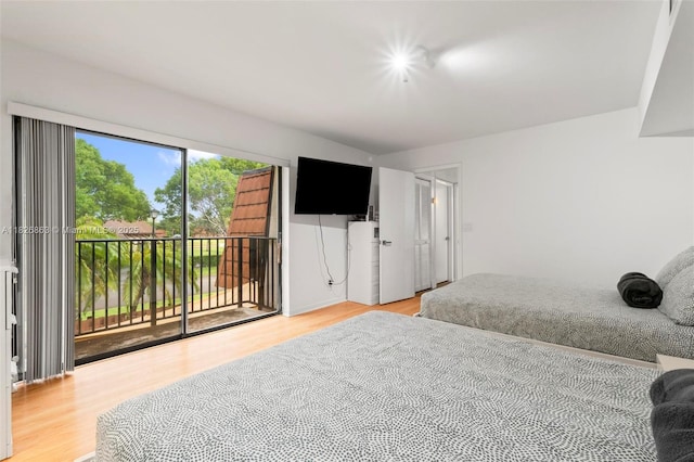 806 SW 119th Way, Davie, FL 33325 - bedroom featuring access to outside and wood finished floors