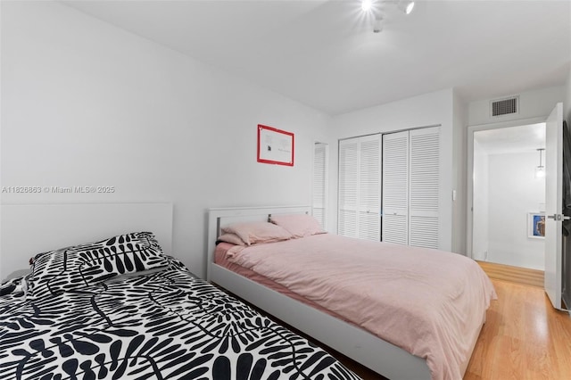 806 SW 119th Way, Davie, FL 33325 - bedroom with a closet and light wood finished floors