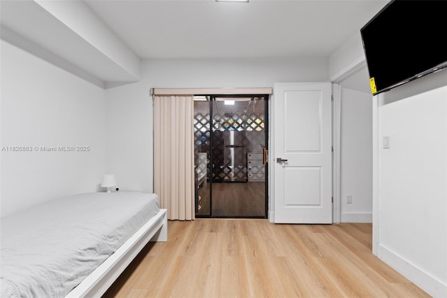 806 SW 119th Way, Davie, FL 33325 - bedroom with light wood-style floors
