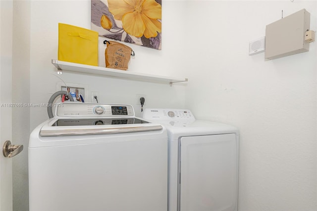 11029 NW 87th St, Doral, FL 33178 - laundry room featuring independent washer and dryer