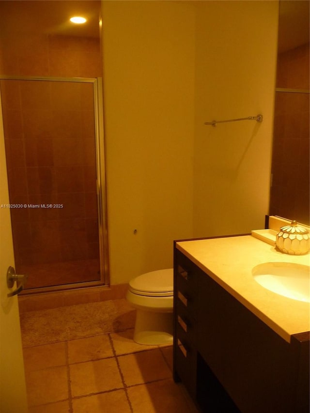 18201 Collins Ave Unit 4705, Sunny Isles Beach, FL 33160 - bathroom featuring vanity, a shower stall, and tile patterned floors