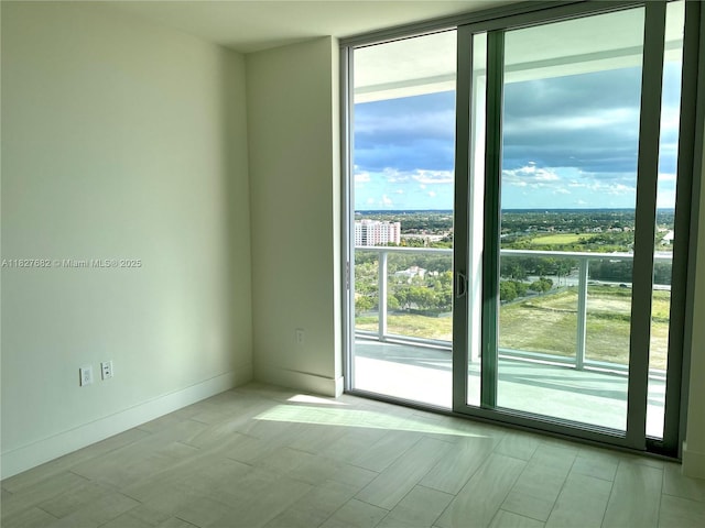 2000 Metropica Way Unit 1605, Sunrise, FL 33323 - spare room featuring expansive windows