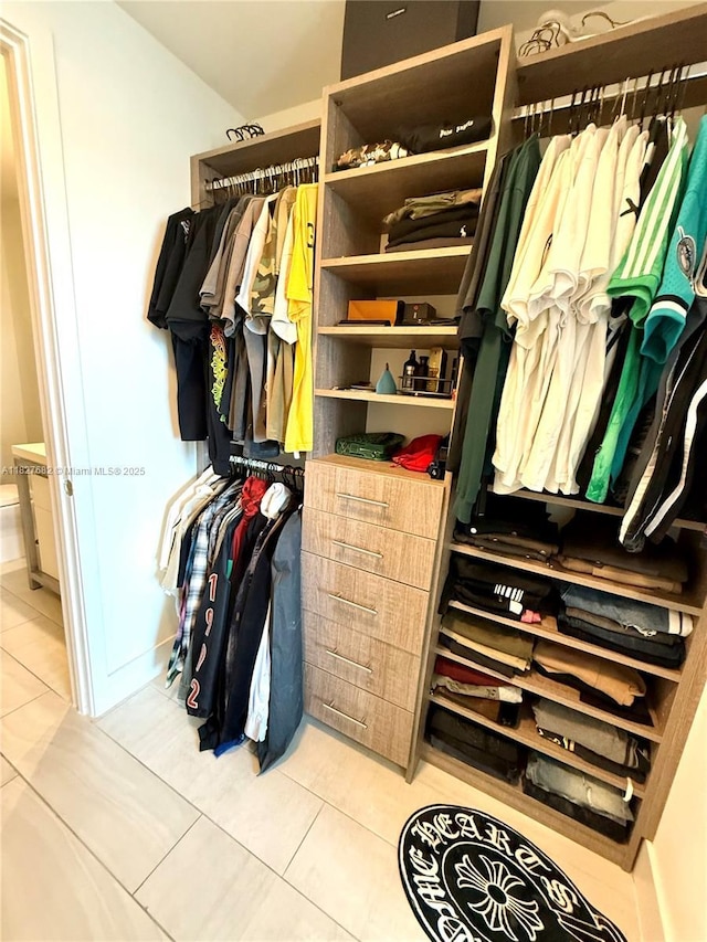 2000 Metropica Way Unit 1605, Sunrise, FL 33323 - spacious closet featuring light tile patterned floors