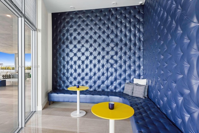 2000 Metropica Way Unit 1605, Sunrise, FL 33323 - community lobby with wallpapered walls and expansive windows