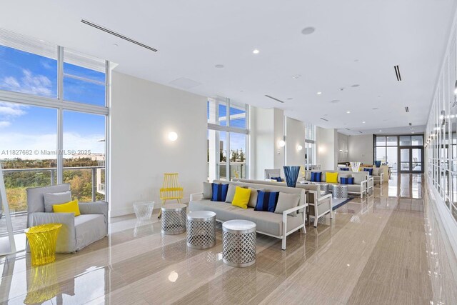 2000 Metropica Way Unit 1605, Sunrise, FL 33323 - building lobby featuring a wall of windows