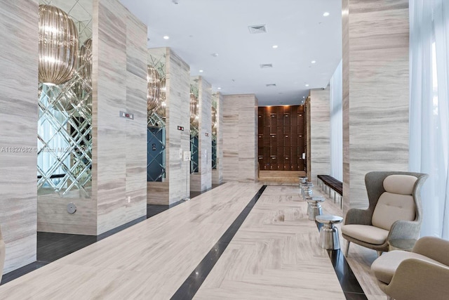 2000 Metropica Way Unit 1605, Sunrise, FL 33323 - common area with recessed lighting and tile walls