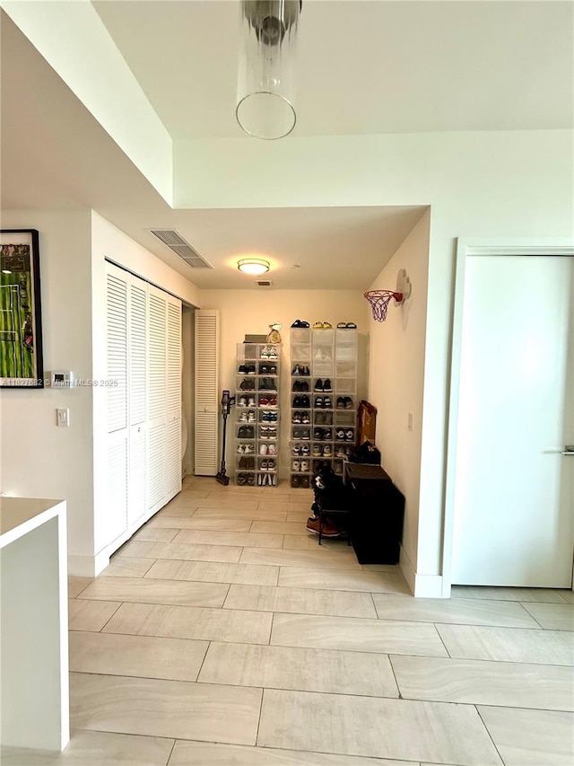 2000 Metropica Way Unit 1605, Sunrise, FL 33323 - corridor featuring baseboards