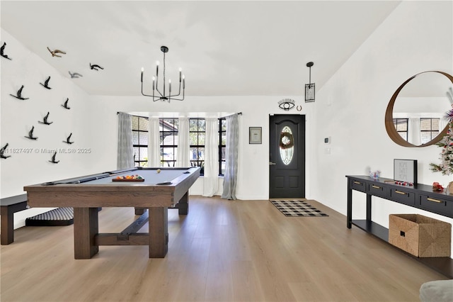 8525 NW 49th Dr, Coral Springs, FL 33067 - recreation room with pool table, light wood-style flooring, and a chandelier