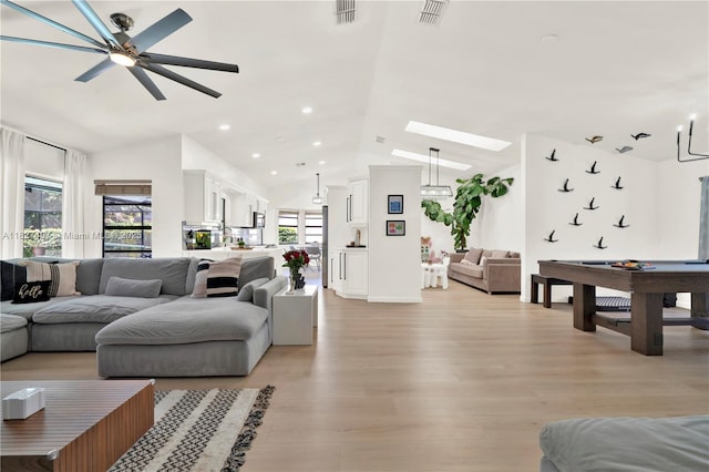 8525 NW 49th Dr, Coral Springs, FL 33067 - living area with vaulted ceiling, light wood-type flooring, plenty of natural light, ceiling fan, and recessed lighting