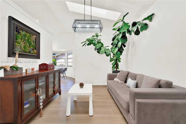 8525 NW 49th Dr, Coral Springs, FL 33067 - living room with light wood finished floors, a skylight, and a chandelier