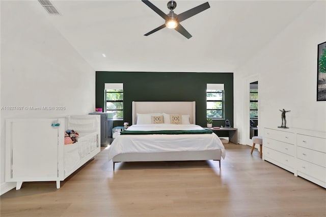 8525 NW 49th Dr, Coral Springs, FL 33067 - bedroom with lofted ceiling, light wood-type flooring, and ceiling fan