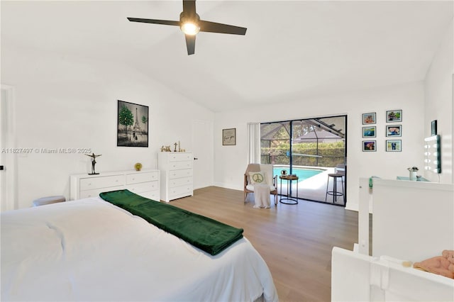 8525 NW 49th Dr, Coral Springs, FL 33067 - bedroom featuring wood finished floors, lofted ceiling, a ceiling fan, and access to outside