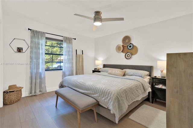 8525 NW 49th Dr, Coral Springs, FL 33067 - bedroom with wood finished floors and ceiling fan