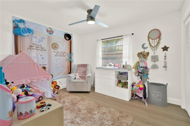 8525 NW 49th Dr, Coral Springs, FL 33067 - bedroom featuring wood finished floors, a closet, and a ceiling fan