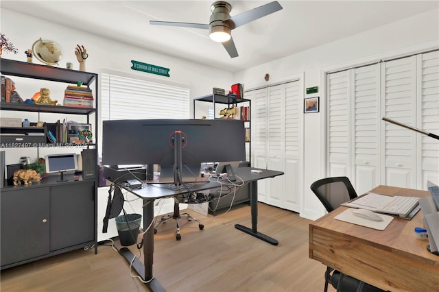 8525 NW 49th Dr, Coral Springs, FL 33067 - home office with a ceiling fan and wood finished floors