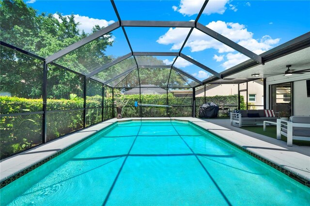 8525 NW 49th Dr, Coral Springs, FL 33067 - swimming pool featuring an outdoor hangout area, a patio area, and a lanai