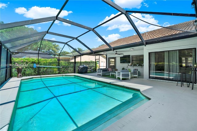 8525 NW 49th Dr, Coral Springs, FL 33067 - swimming pool featuring a patio, a ceiling fan, and glass enclosure