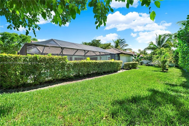 8525 NW 49th Dr, Coral Springs, FL 33067 - view of grassy yard with glass enclosure