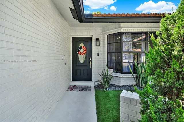 8525 NW 49th Dr, Coral Springs, FL 33067 - view of exterior entry featuring brick siding