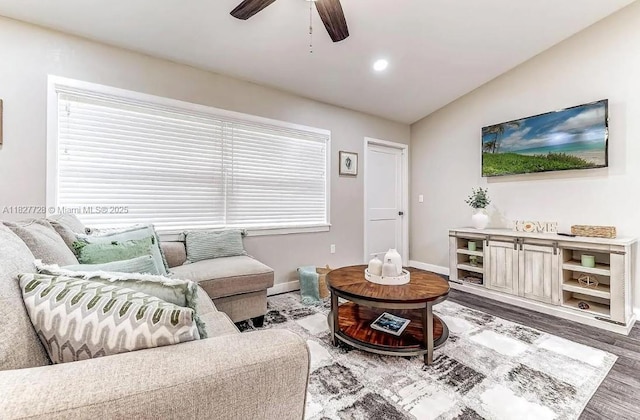 220 Kite Ave, Sebring, FL 33870 - living room featuring wood finished floors, ceiling fan, healthy amount of natural light, recessed lighting, and lofted ceiling
