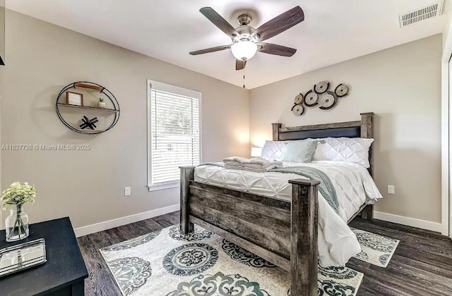 220 Kite Ave, Sebring, FL 33870 - bedroom featuring dark wood finished floors and a ceiling fan