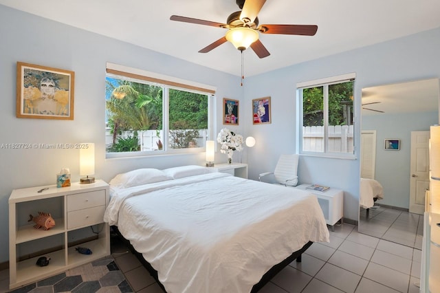 634 82nd St, Miami Beach, FL 33141 - tiled bedroom featuring ceiling fan