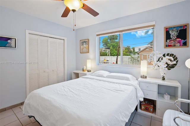 634 82nd St, Miami Beach, FL 33141 - bedroom with tile patterned flooring, a closet, and ceiling fan