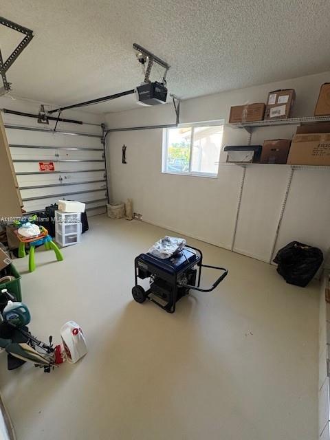 13736 SW 12th St, Miami, FL 33184 - garage featuring a garage door opener