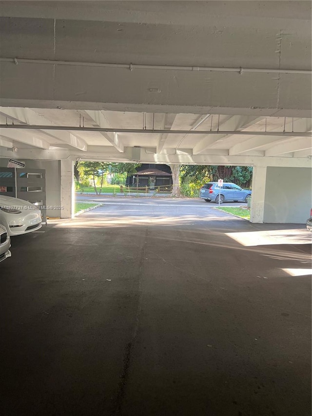 645 NE 121st St Unit 404, North Miami, FL 33161 - view of parking garage