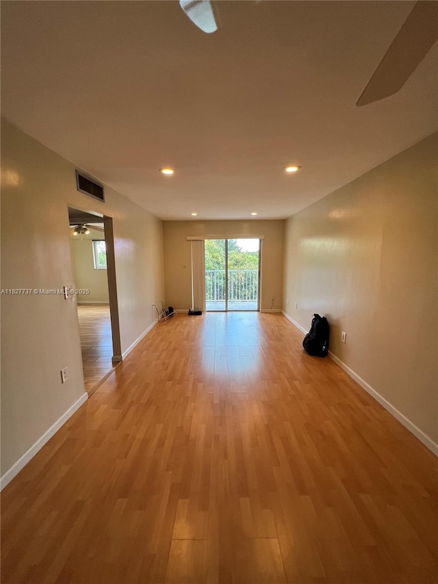 645 NE 121st St Unit 404, North Miami, FL 33161 - unfurnished room featuring light wood finished floors and recessed lighting