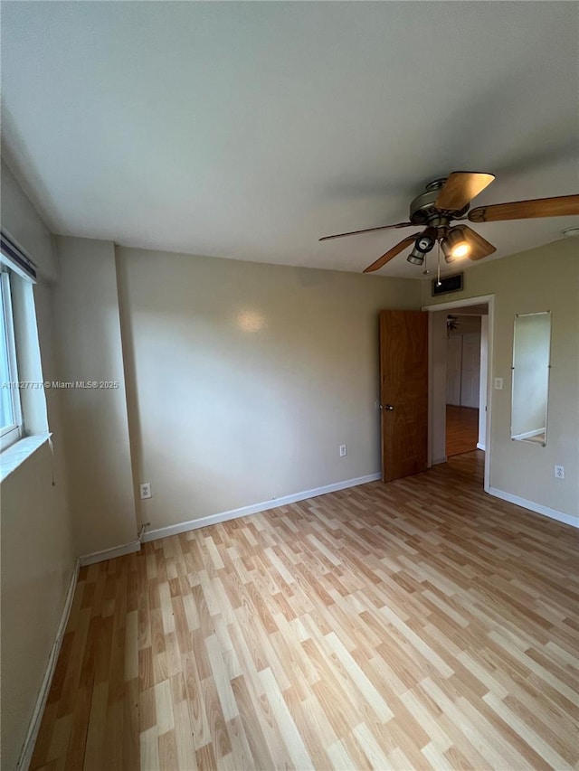 645 NE 121st St Unit 404, North Miami, FL 33161 - unfurnished room with a ceiling fan and light wood-type flooring