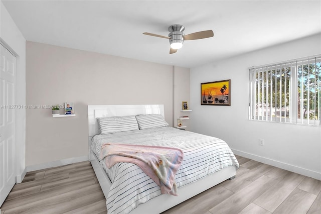 9525 Weldon Cir Unit H305, Tamarac, FL 33321 - bedroom featuring light wood finished floors and ceiling fan