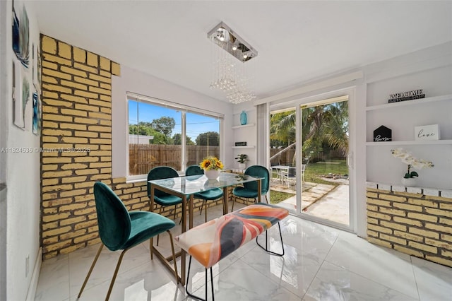 2714 Fillmore St, Hollywood, FL 33020 - sunroom featuring a chandelier