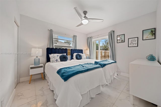 2714 Fillmore St, Hollywood, FL 33020 - bedroom featuring light marble finish floors, a ceiling fan, and access to exterior