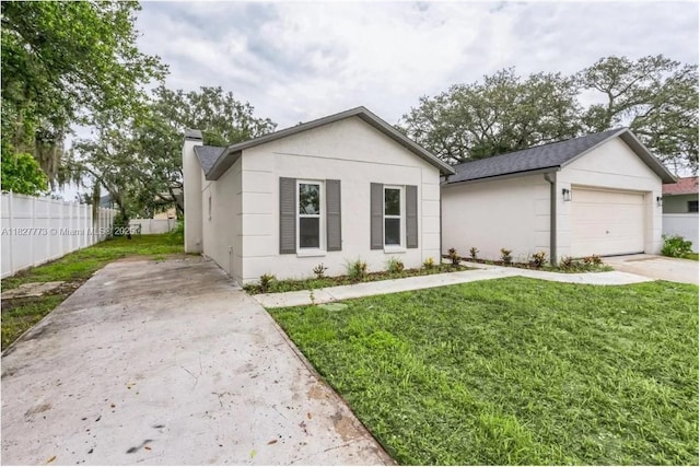 6065Waycross Drive, Spring Hill, FL 34606 - view of front of home with concrete driveway, stucco siding, a chimney, and a garage