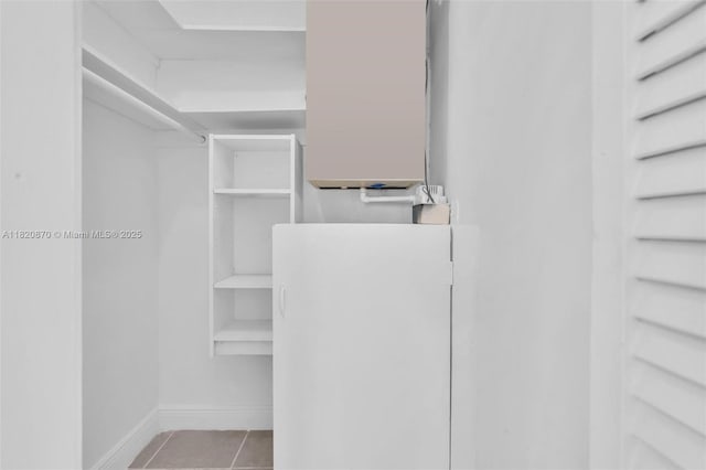 750 84th St, Miami Beach, FL 33141 - walk in closet with tile patterned flooring