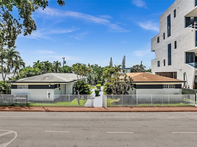 750 84th St, Miami Beach, FL 33141 - view of property featuring a fenced front yard