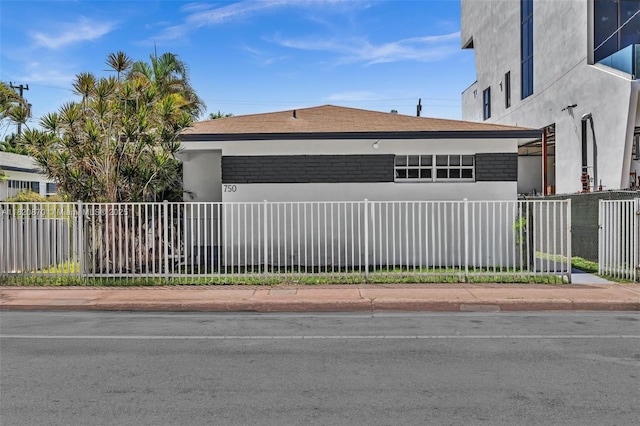 750 84th St, Miami Beach, FL 33141 - view of side of property featuring stucco siding