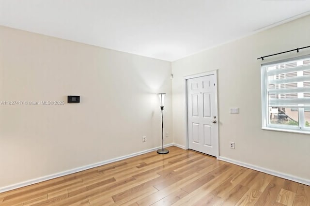 2872 SW 127th Way Unit 1, Miramar, FL 33027 - empty room with light wood-style flooring and baseboards