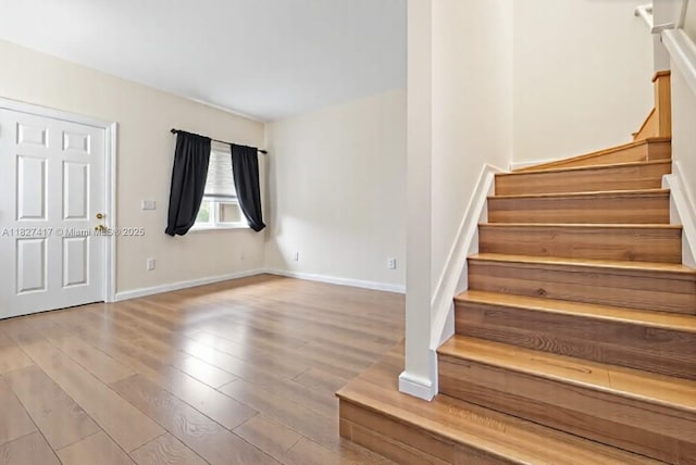 2872 SW 127th Way Unit 1, Miramar, FL 33027 - entrance foyer featuring stairs and wood finished floors