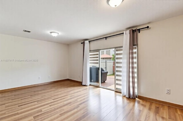 2872 SW 127th Way Unit 1, Miramar, FL 33027 - empty room with light wood-style flooring and baseboards
