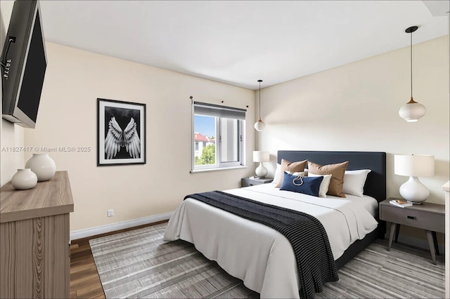 2872 SW 127th Way Unit 1, Miramar, FL 33027 - bedroom with wood finished floors and baseboards