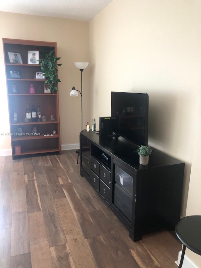 50 Menores Ave Unit 711, Coral Gables, FL 33134 - living room with dark wood-type flooring and baseboards