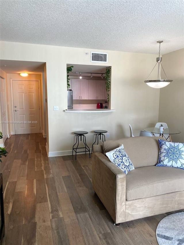 50 Menores Ave Unit 711, Coral Gables, FL 33134 - living area with dark wood finished floors and a textured ceiling