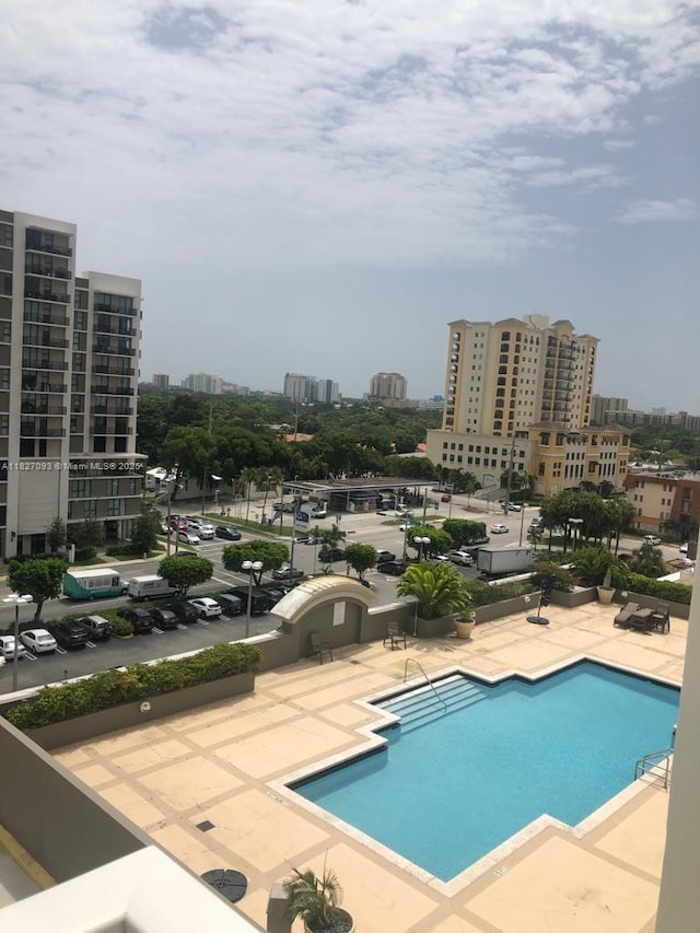 50 Menores Ave Unit 711, Coral Gables, FL 33134 - community pool with a city view and a patio